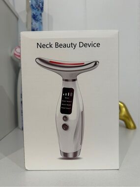 Ulta Beauty White and Silver Neck Beauty Device